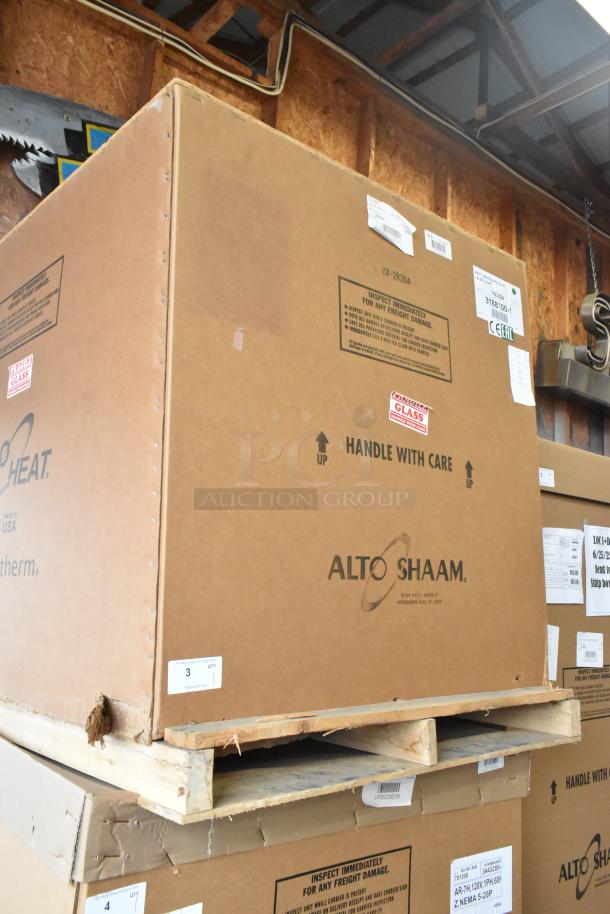 Brand new Alto Shaam AR-7T rotisserie oven in box, stainless steel, electric, 380-415 volts, 1 phase. Handle with care labels.