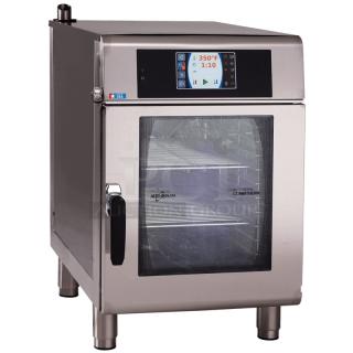 Brand new Alto Shaam CTX4-10E stainless steel combi oven. Full-size, boilerless, 380-415V, 3-phase. Digital display.