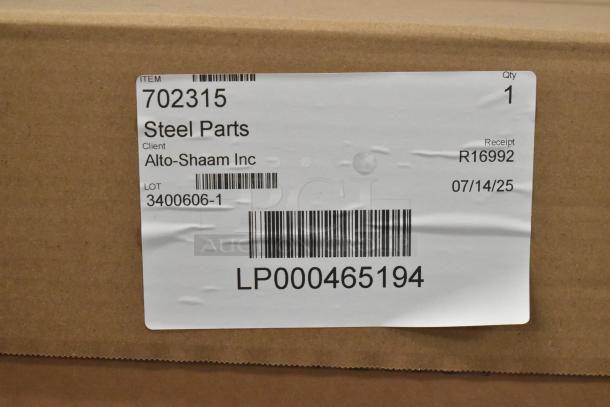 Brand new Alto Shaam AR-7T rotisserie oven box with label. Model AR-7T, 208 Volts, 1 Phase. Barcodes and lot number visible.