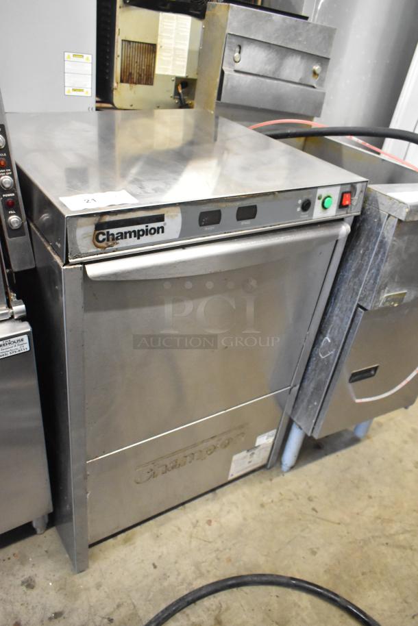 Champion UIH30B stainless steel commercial undercounter dishwasher, 120-208/230V, 1 phase, visible controls, signs of wear.