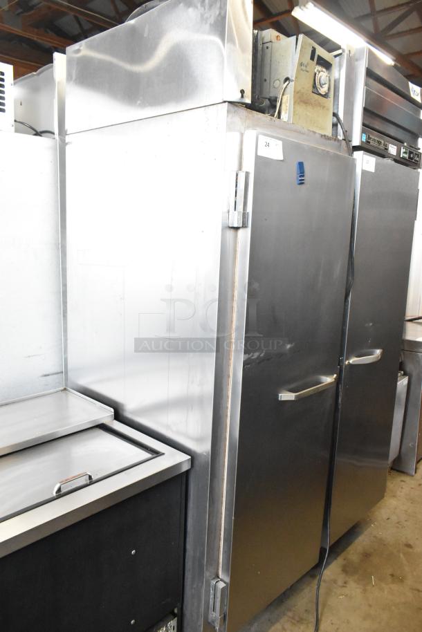 Continental DL1F-SA stainless steel commercial single-door reach-in freezer with poly-coated racks, 115V, 1 phase.