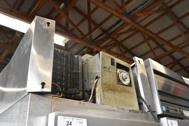 Continental DL1F-SA stainless steel commercial freezer, single door, poly coated racks, 115 volts, visible wear.