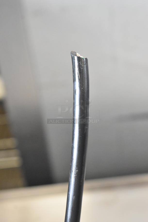 A frayed power cable for a Continental CBC50 bottle cooler. Potential safety issue, needs repair.