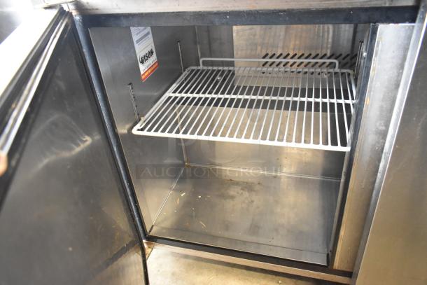 2019 Bison BUR-48 stainless steel 2-door undercounter cooler, clean interior, visible Bison label, 115 volts, 1 phase.