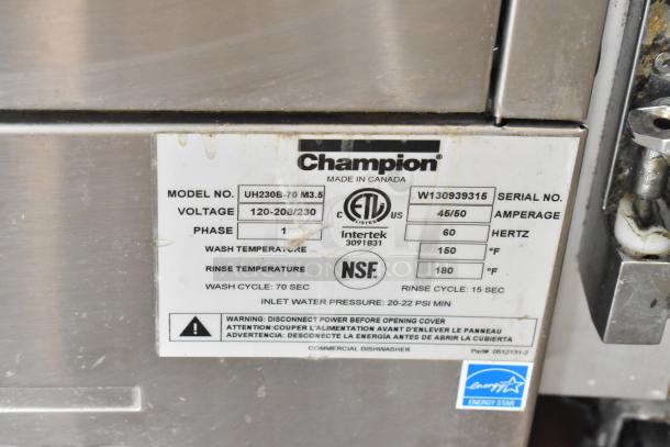 Champion UH230B-70 stainless steel undercounter dishwasher, 120-208/230V, 1 phase, commercial use. Labels show model and voltage details.