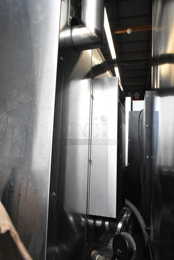 Blodgett BCX-14 stainless steel combi convection oven steamer, view through doors, metal racks, thermostatic controls.