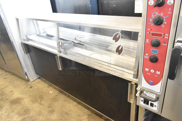 Vollrath 36150-00002-CNC stainless steel buffet station, commercial casters, 240V, 1 phase, visible control panel.