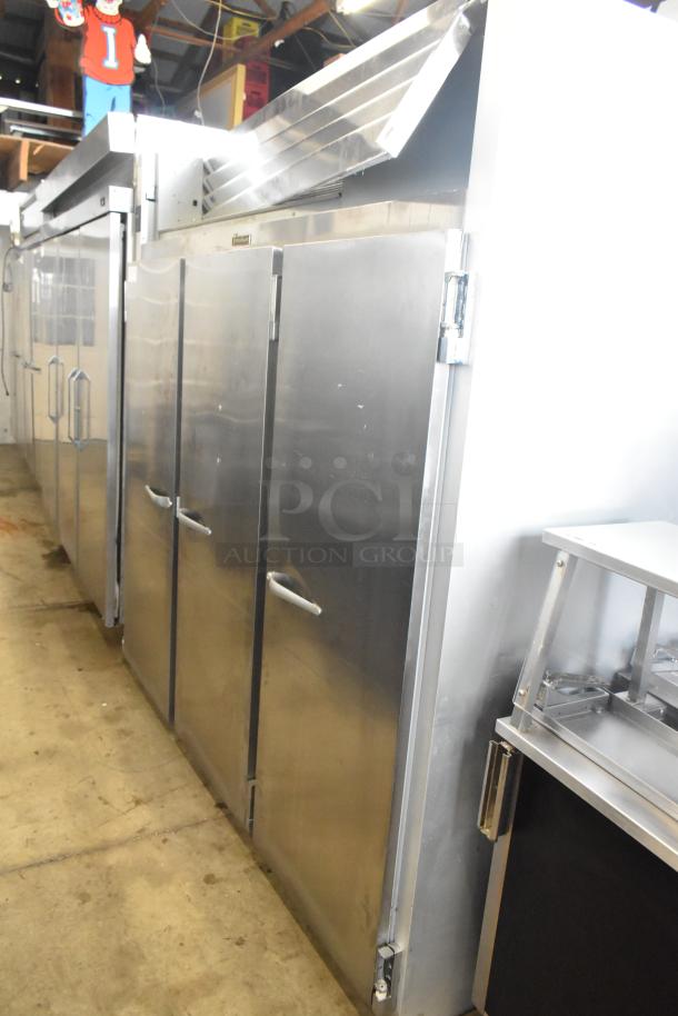 2016 Traulsen G31310 stainless steel 3-door commercial freezer, poly-coated racks, 115/208-230V, 1 phase, good condition.