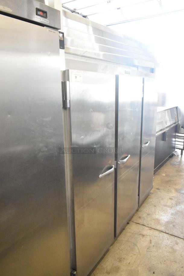 2016 Traulsen G31310 stainless steel 3-door commercial freezer with poly-coated racks, in good condition. 115/208-230V, 1 phase.
