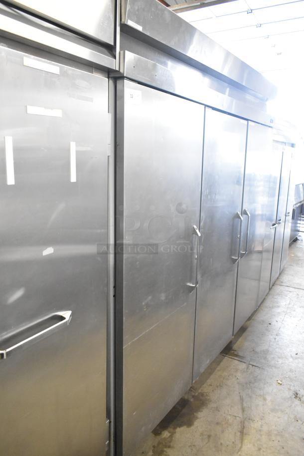 Hobart DAF3 stainless steel commercial 3-door reach-in freezer with poly coated racks; 115/208-240V, 1 phase.
