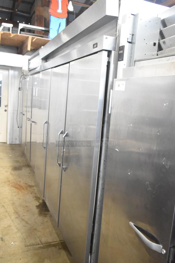 Hobart DAF3 stainless steel 3-door commercial freezer, poly coated racks, 115/208-240V, 1 phase, used condition.
