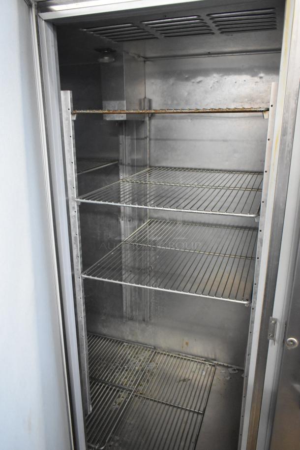 Hobart DAF3 stainless steel 3-door commercial freezer, poly coated racks, 115/208-240V, 1 phase, interior view.