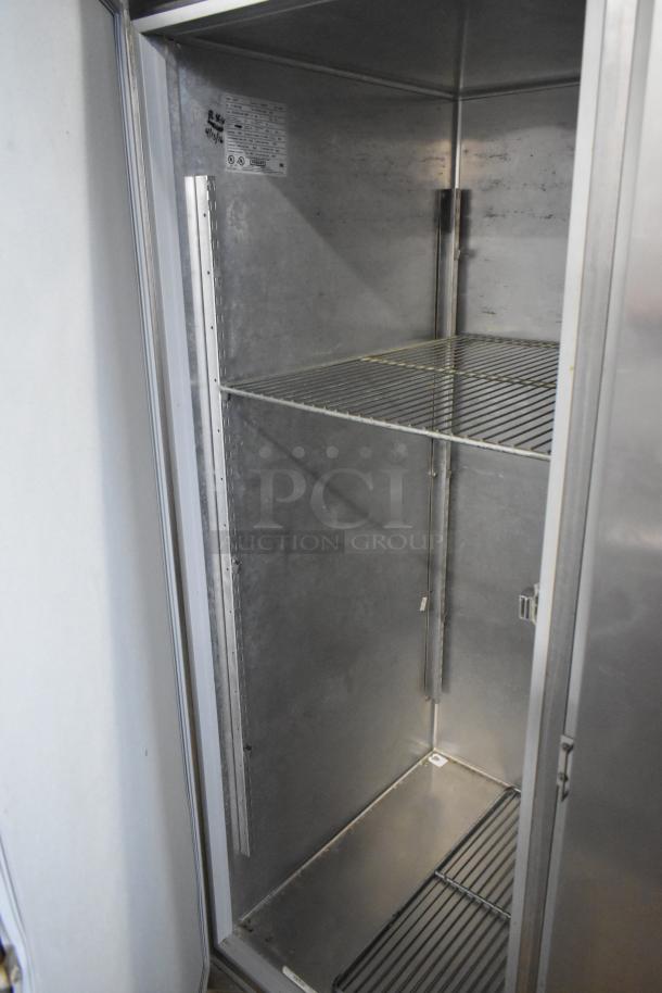 Hobart DAF3 stainless steel 3-door reach-in freezer with poly coated racks, visible interior, 115/208-240V, 1 Phase.