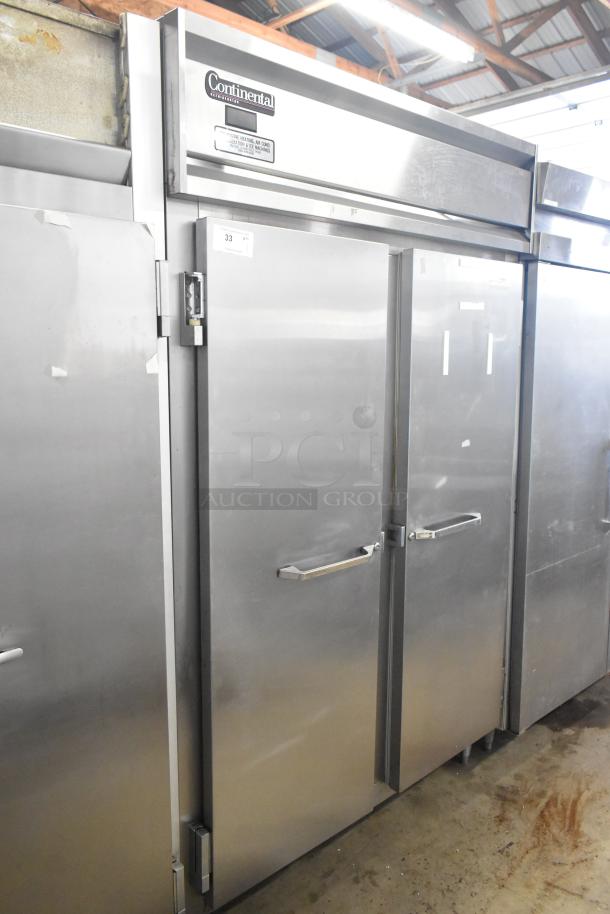Continental DL2R-SA stainless steel 2-door reach-in cooler, 115V, 1 phase, excellent condition, visible brand label.