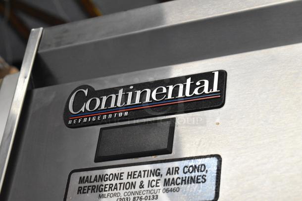 Continental DL2R-SA stainless steel commercial 2-door reach-in cooler. Visible brand logo. Model label from Malangone Heating.