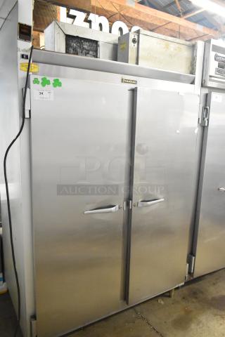 Traulsen G20010 Stainless Steel 2 Door Reach-In Cooler with poly-coated racks, 115V, 1 phase; commercial use.