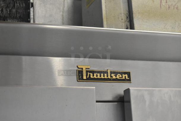 Traulsen G20010 stainless steel commercial cooler, 2-door, poly-coated racks, 115V, 1 Phase, logo visible.