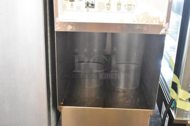 Bunn ICDD-3 stainless steel reservoir stand, in used condition. Suitable for beverage dispensing, with visible wear marks.