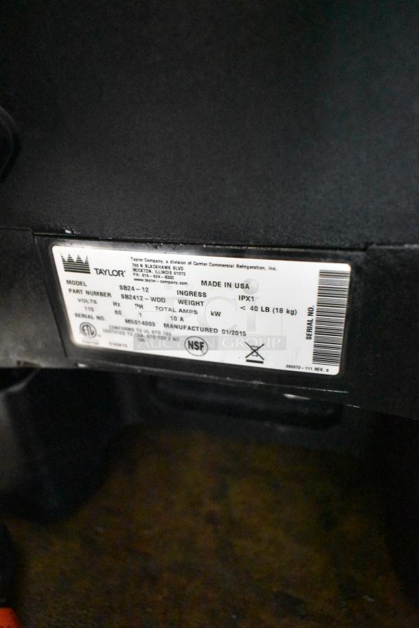 Taylor SB24-12 stainless steel commercial drink blender. 115V, 1-phase. Model label shows part number SB24-12-WDD.