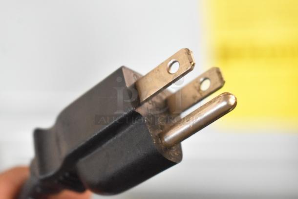 Close-up of a power plug for a Taylor SB24-12 drink blending machine, showing a standard 115V, 1-phase connector.