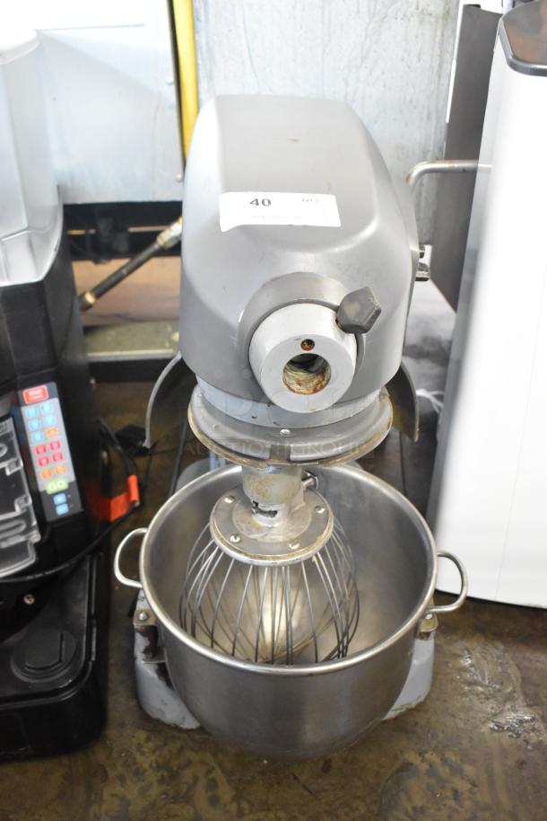 Hobart Legacy HL200 20 Qt metal dough mixer with bowl and whisk, 100-120V, 1 Phase, commercial use, visible wear.