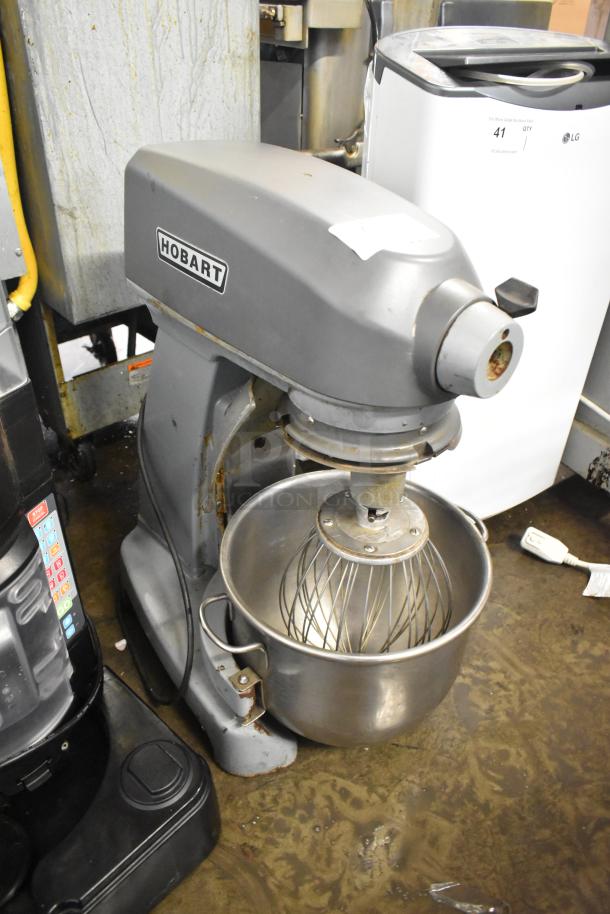 Hobart Legacy HL200 20 Qt metal dough mixer with bowl and whisk attachment, 100-120V, used condition, visible wear.