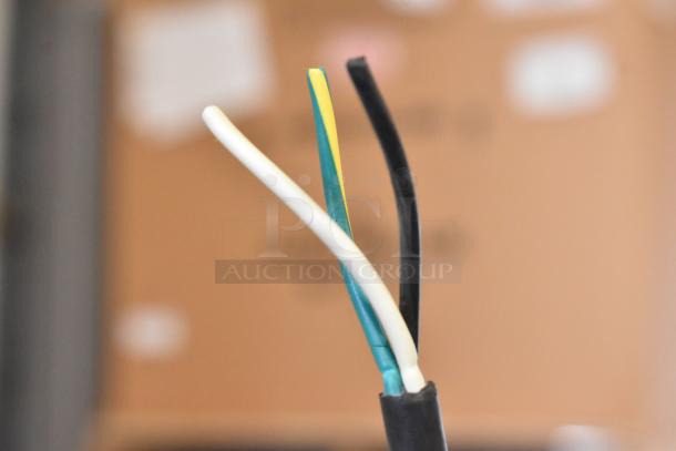 A close-up of electrical wires; not the Hobart Legacy HL200 dough mixer.