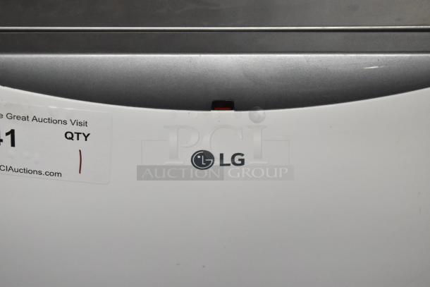LG LP1415WXRSM Portable Air Conditioner, 14,000 BTU, 115 Volts, logo and auction label visible on the unit.