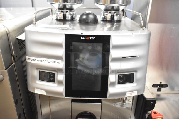 Schaerer Coffee Art Plus commercial espresso machine with dual hoppers. Metal exterior, automatic, 120-208/240V, 1 phase.