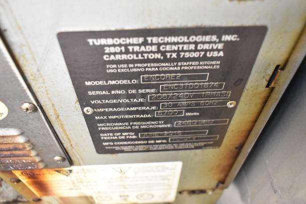 Turbochef Encore2 oven label showing model info, voltage 208/240V, 1 phase, 30 amps, 6700 watts, June 2016 manufacture.