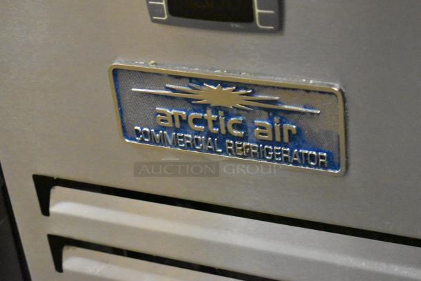 Arctic Air ARCB60CZ stainless steel chef base, commercial 2-drawer unit on casters, 115V, logo badge visible.