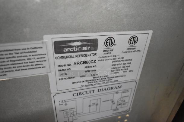 Arctic Air ARCB60CZ commercial refrigerator label, showing model, batch, refrigerant details, and certification markings.