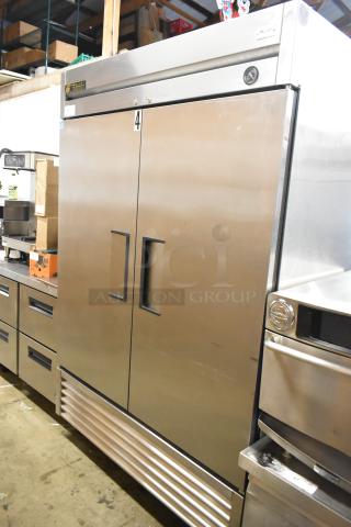 True T-49 Stainless Steel Commercial 2 Door Reach In Cooler w/ Poly Coated Racks on Commercial Casters. 115 Volts, 1 Phase. - Item #1218361
