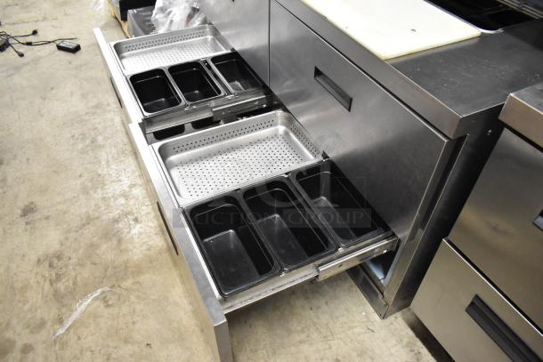Delfield UCD4464N-12-DD5 stainless steel prep table with 4 drawers, over shelf, and bain marie. 115V, 1 phase, excellent condition.