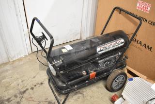 Thermoheat RMC-KFA125TL1 kerosene heater, black, dual heat 100,000-125,000 BTU, visible controls, used condition.