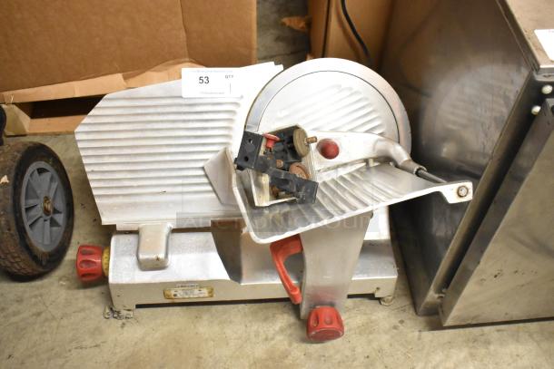 Berkel 827A commercial meat slicer with blade sharpener, silver metal, 115V, 1 phase, pre-owned with visible wear.