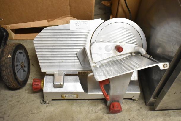 Berkel 827A metal commercial countertop meat slicer with blade sharpener, 115 volts, 1 phase, in good condition.