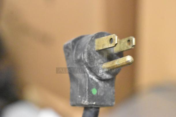 Close-up of a power plug for the Beverage Air UCR20Y-141 undercounter cooler, 115 volts, 1 phase.