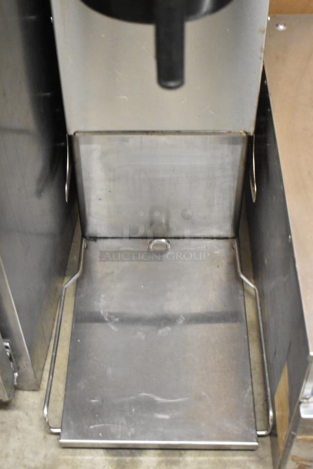 Bunn ITCB-DV stainless steel iced tea machine, features hot water dispenser, poly brew basket, 120V, 1 Phase, good condition.