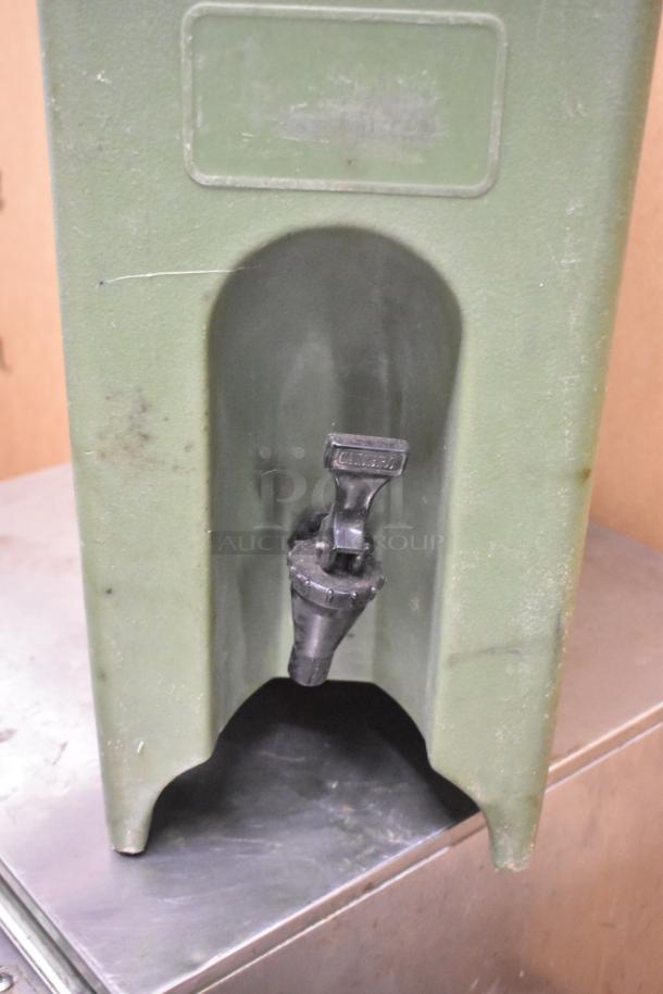 Cambro 500LCD green poly insulated beverage dispenser, visible spout, used condition, ideal for hot or cold drinks.