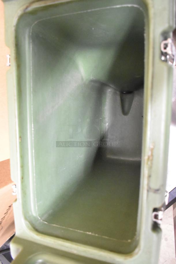 Cambro 500LCD green poly insulated beverage holder. Interior view, good condition, secured with metal latches.