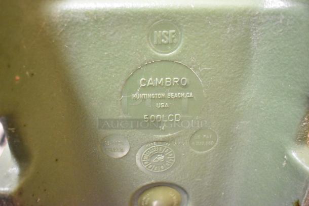 Cambro 500LCD green poly insulated beverage holder, marked with NSF certification, made in USA. Visible wear and usage marks.
