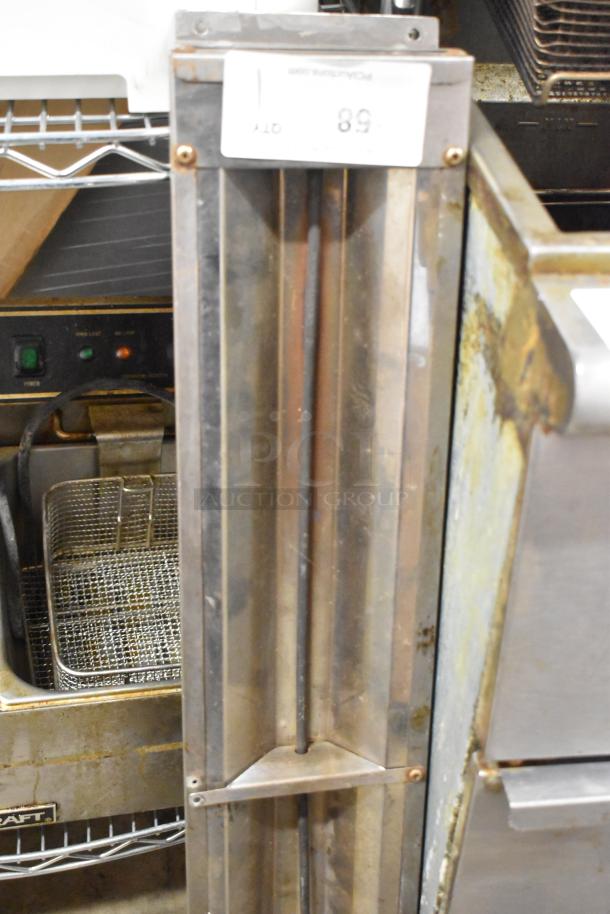 APW Wyott FD-60 metal commercial heat strip, used condition, 120 volts, 1 phase, visible wear, auction tag present.