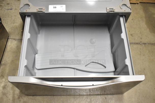 LG WDP4V stainless steel washer/dryer pedestal, open drawer, excellent condition, label showing item number 59.