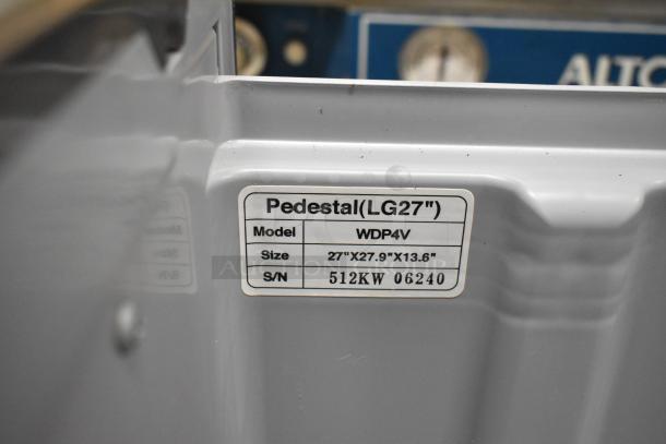 LG WDP4V stainless steel pedestal for washer/dryer, model WDP4V, size 27"x27.9"x13.6". Serial number 512KW 06240.