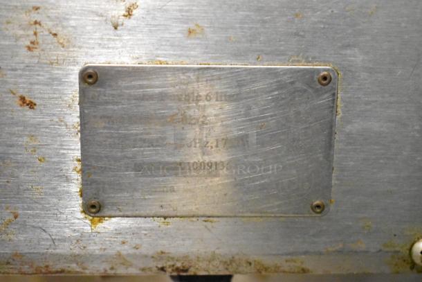 Adcraft stainless steel double fryer, electric, with 2 metal baskets. Features 120 volts, 1 phase. Shows signs of wear.