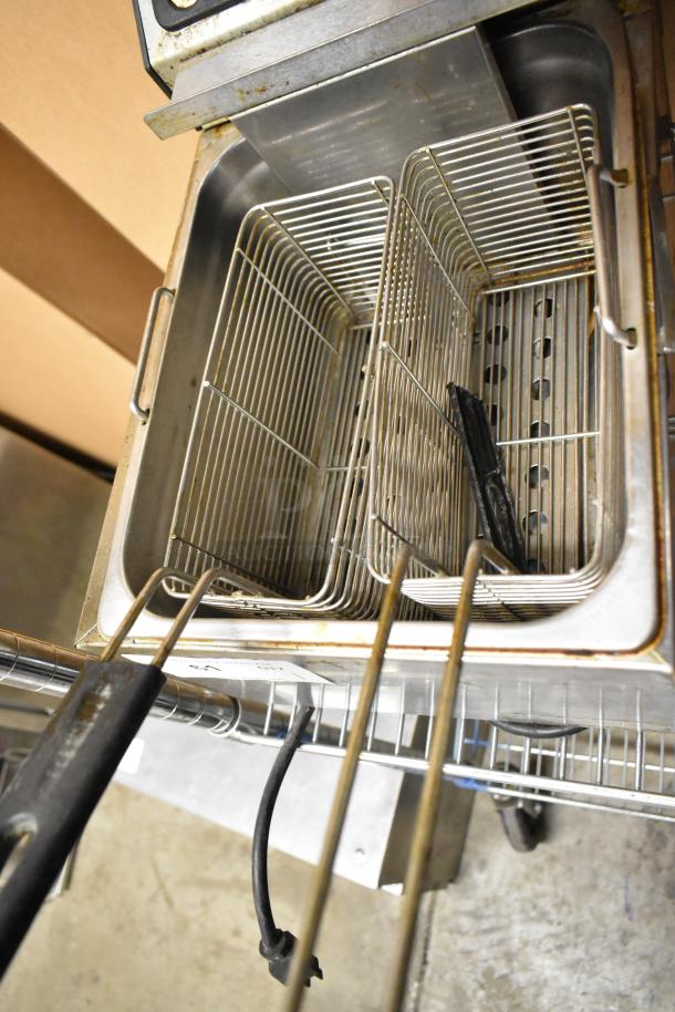 Adcraft stainless steel countertop deep fryer with two metal baskets, electric powered, 120 volts, 1 phase, visible cord.