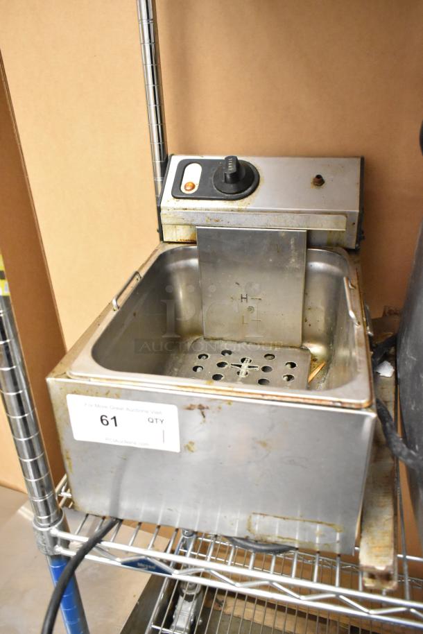 Adcraft stainless steel countertop deep fat fryer, electric, 120V, with control knob. Includes 2 metal baskets. Used condition.