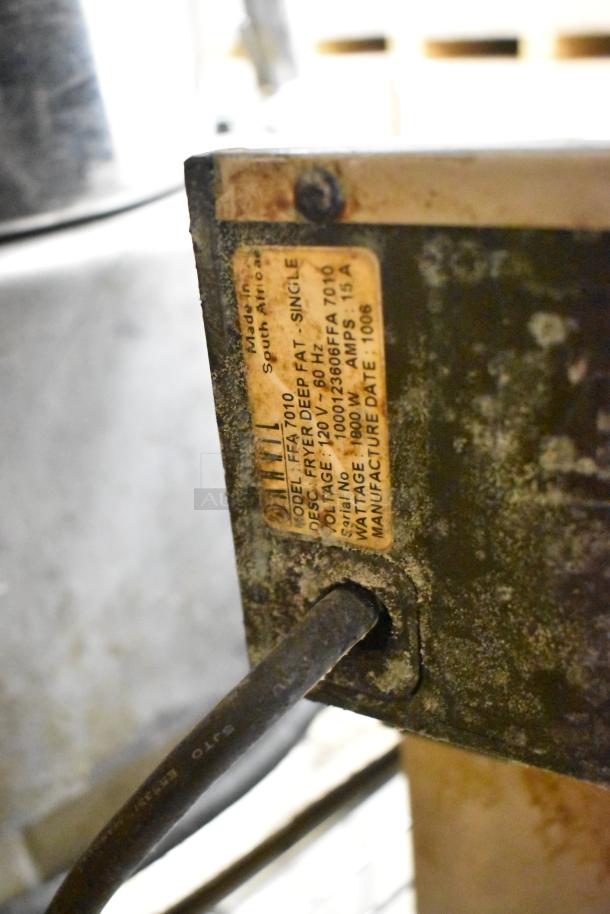 Adcraft stainless steel countertop electric fryer with 2 baskets, model FFA 7010. 120V, 1 phase. Signs of wear and manufacturer tag visible.