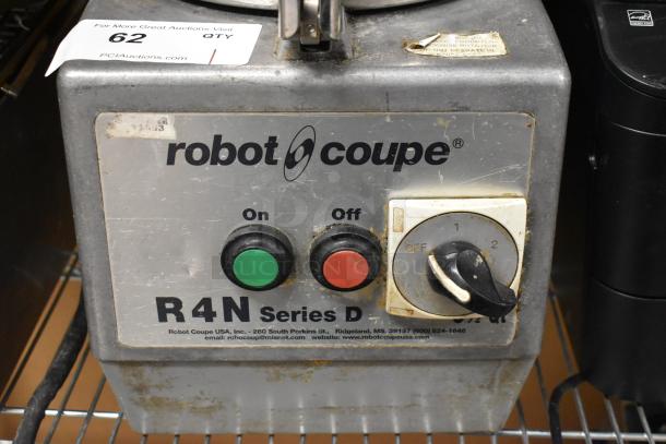 Robot Coupe R4N metal commercial food processor with bowl and S blade, 220V, 3 phase. Shows wear, includes control panel details.
